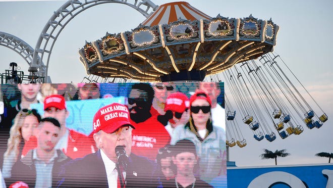 Wildwood, New Jersey | Donald Trump's speech is shown on a large screen as he holds a rally on the beach in Wildwood, N.J., on May 11, 2024.