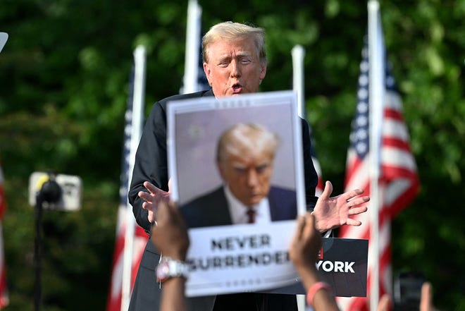 Former US President and Republican presidential candidate Donald Trump speaks during a campaign rally in the South Bronx in New York City on May 23, 2024.