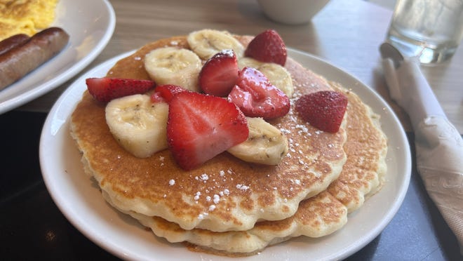 The Hudson Cafe is known for its pancakes with whirls of cream cheese frosting and sweet toppings, but its original buttermilk cakes are just as tasty.